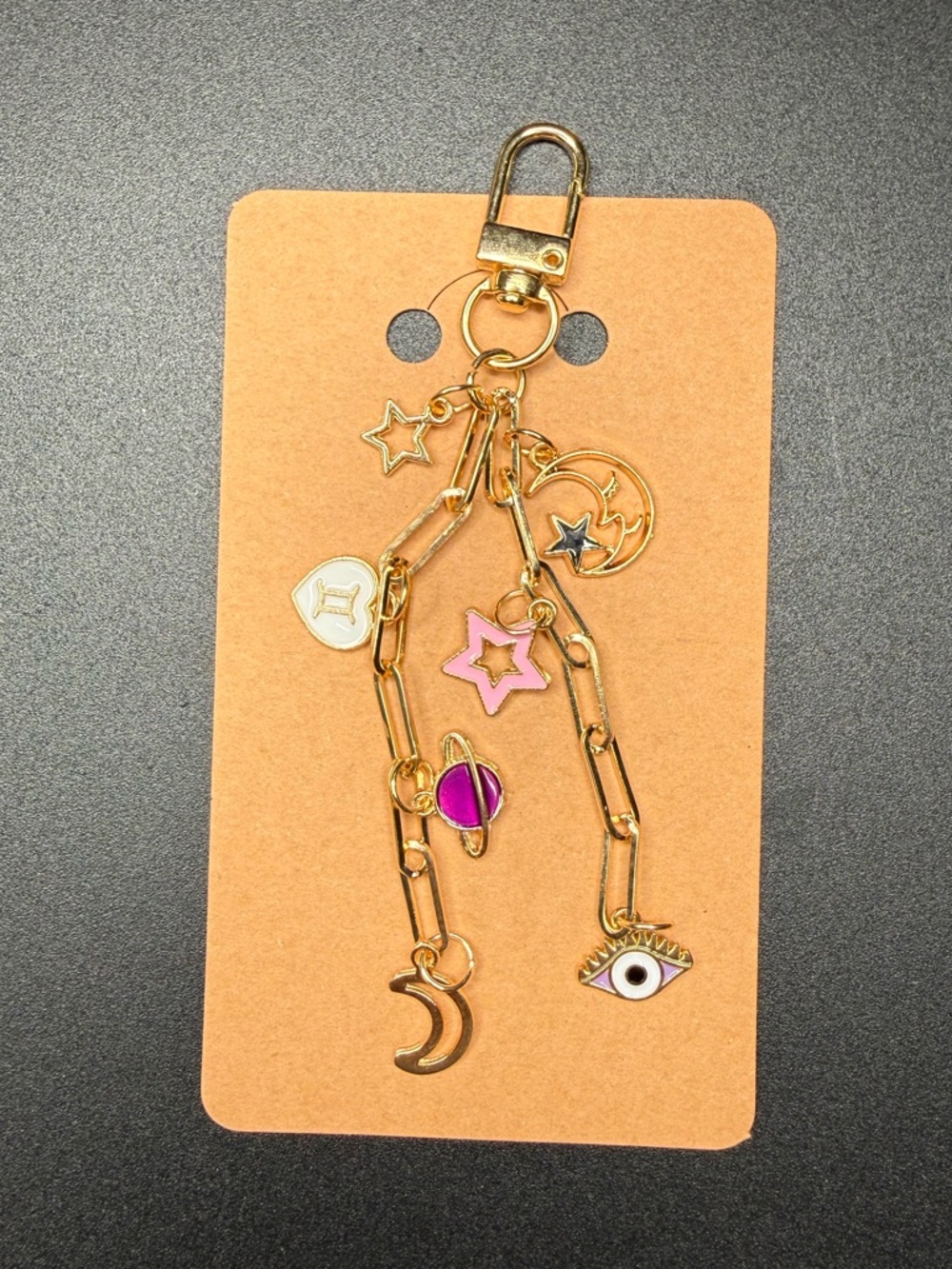 Celestial gold tone keychain